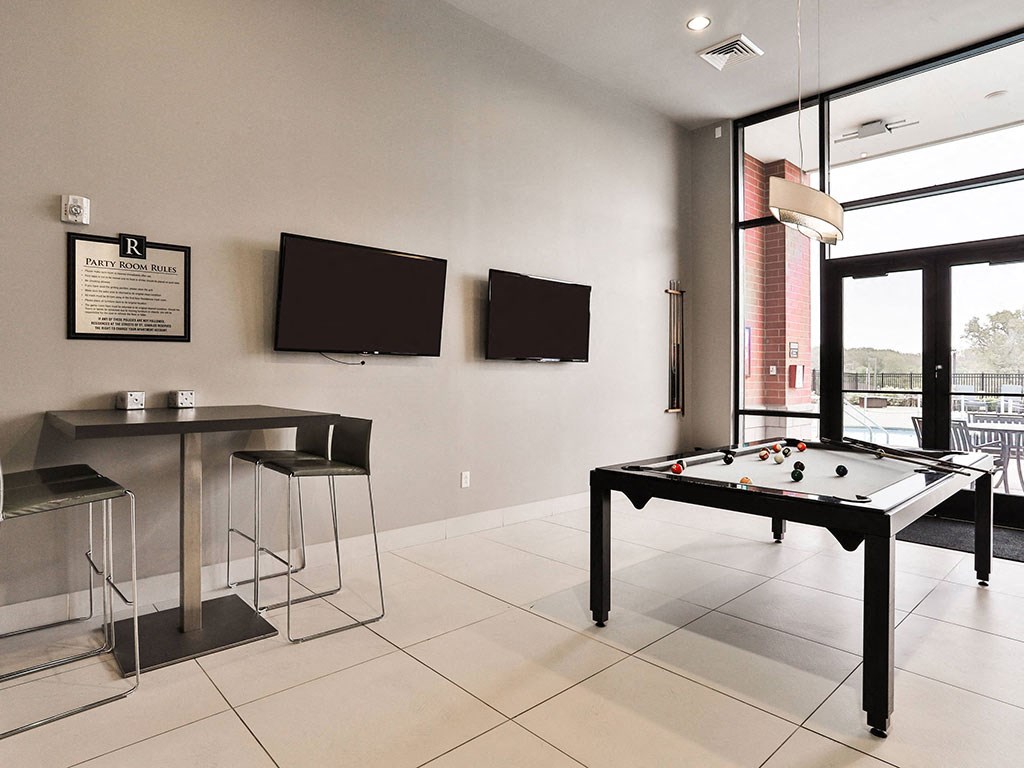 Clubhouse at Residences at The Streets of St. Charles Apartments in Missouri