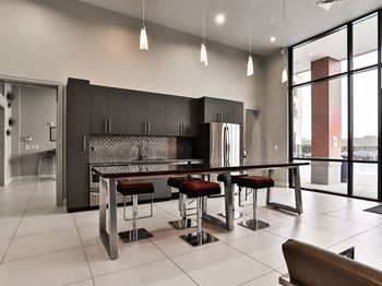 Clubhouse Kitchen and Dining at Residences at The Streets of St. Charles in St. Charles, MO
