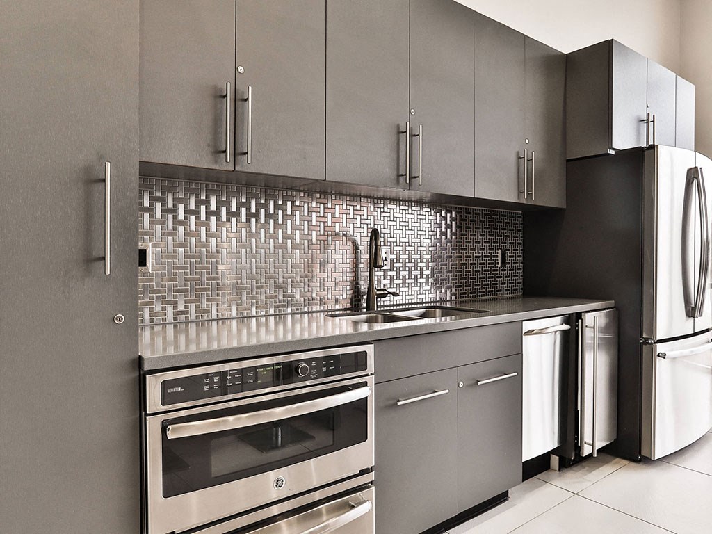 Kitchen area at Residences at The Streets of St. Charles Apartments in St. Charles, Missouri