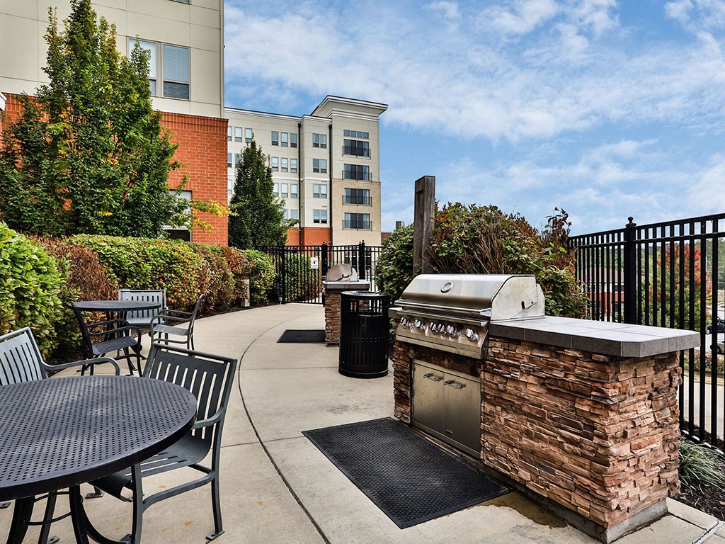 Outside Grill area at Residences at The Streets of St. Charles Apartments in  St. Charles, 63303