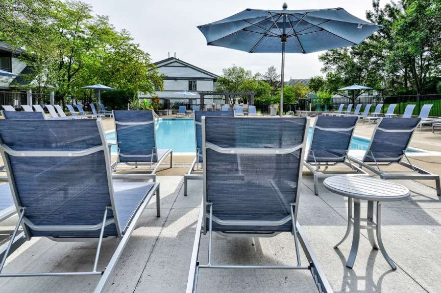 Poolside Relaxing Chairs at The Villas at Northstar Apartments in Ann Arbor, MI