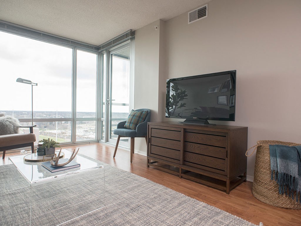 Living Room With Television at Optima Old Orchard Woods, Illinois