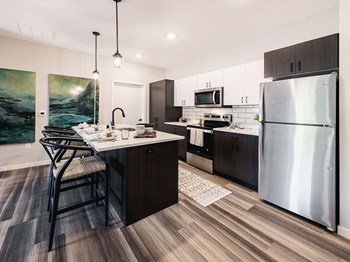 Kitchen Kitchenat Velo Village Apartments, Wisconsin, 53132 - Photo Gallery 3