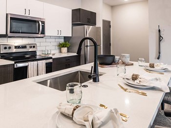 Kitchen area at Velo Village Apartments, Franklin, Wisconsin - Photo Gallery 4