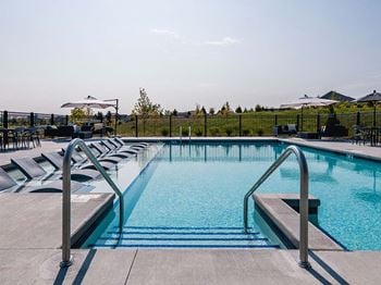 Pool view at Velo Village Apartments, Wisconsin, 53132
