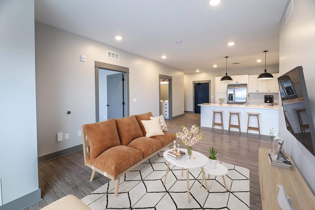 Living Room & Kitchen in Open Concept Layout at The Commons at Rivertown, Grandville, MI