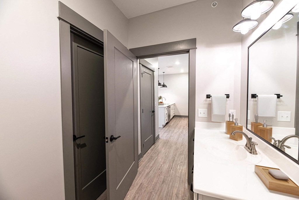 a bathroom with a sink at The Commons at Rivertown, Grandville, 49418
