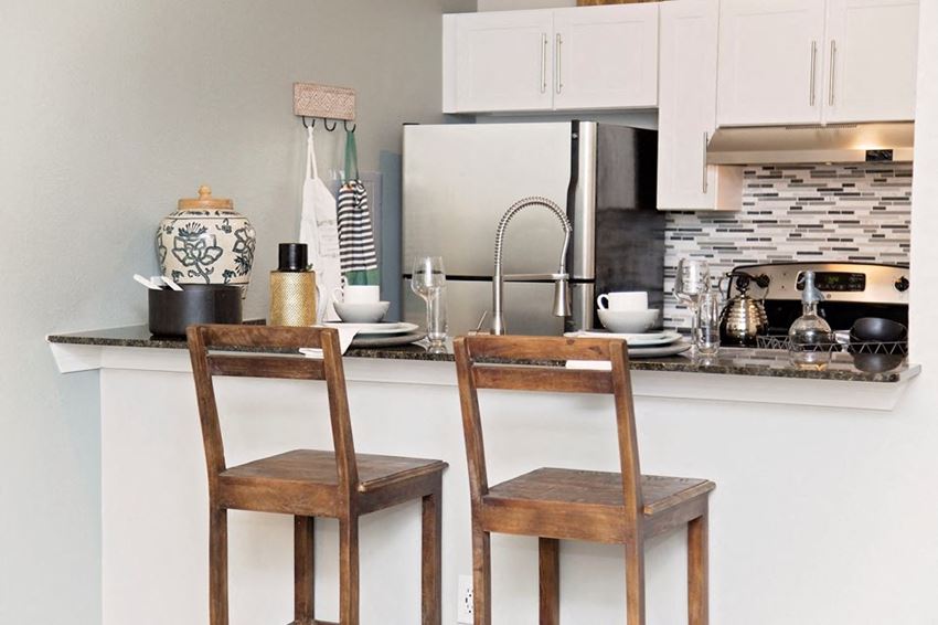 Two bar stools at model home kitchen counter