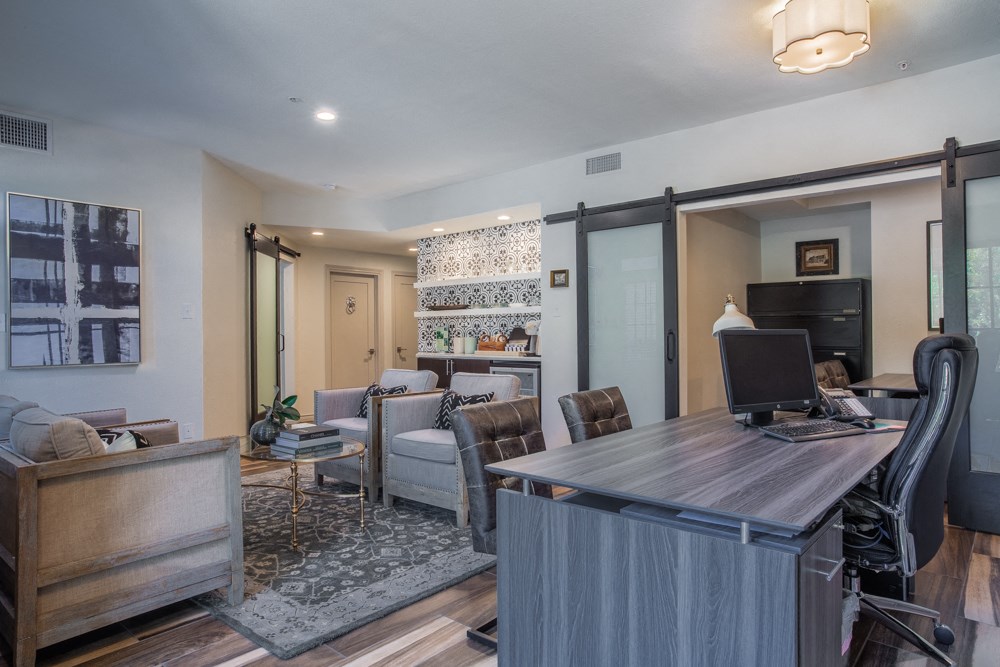 Leasing office desk and sitting area