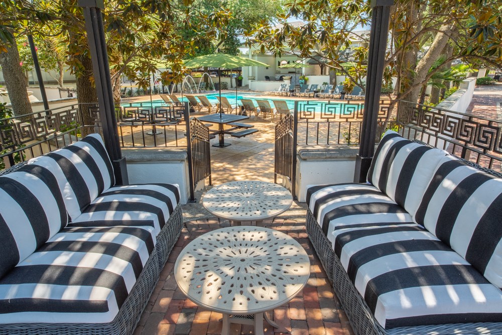 Outdoor shaded sitting area with tables