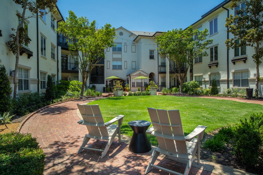 Community lawn area with chairs