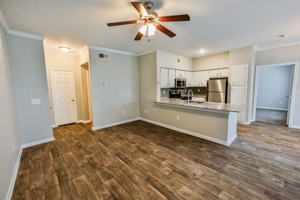 Graves Floorplan, unfurnished kitchen and living room  at The Villages of Briar Forest, Texas