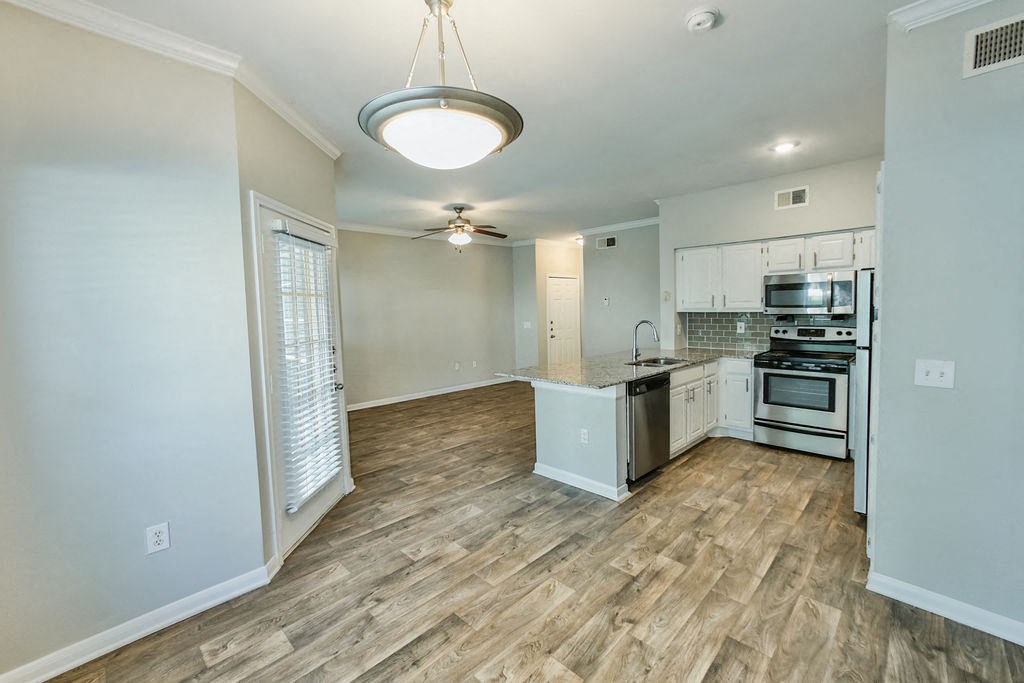 Graves Floorplan, unfurnished kitchen and living room  at The Villages of Briar Forest, Houston, 77077