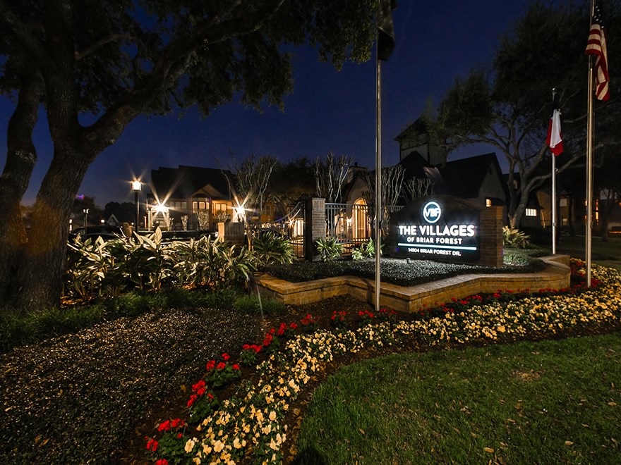 Community Monument Sign at Night  at The Villages of Briar Forest, Texas, 77077