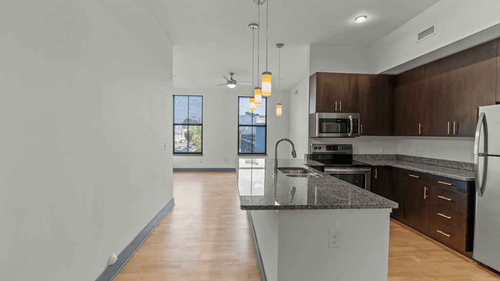 a kitchen with a counter top and a sink
