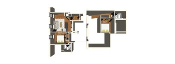 A floor plan of a two-story building with a living room, kitchen, and bathrooms.