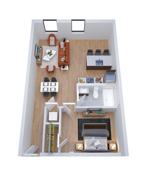 A top-down view of a small apartment with a kitchen, living room, and bedroom.