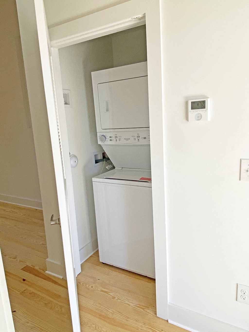 a small laundry room with a washer and dryer