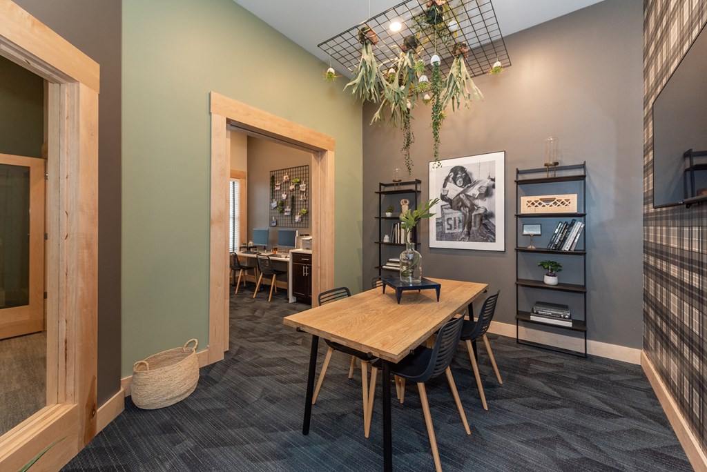 a room with a table and chairs