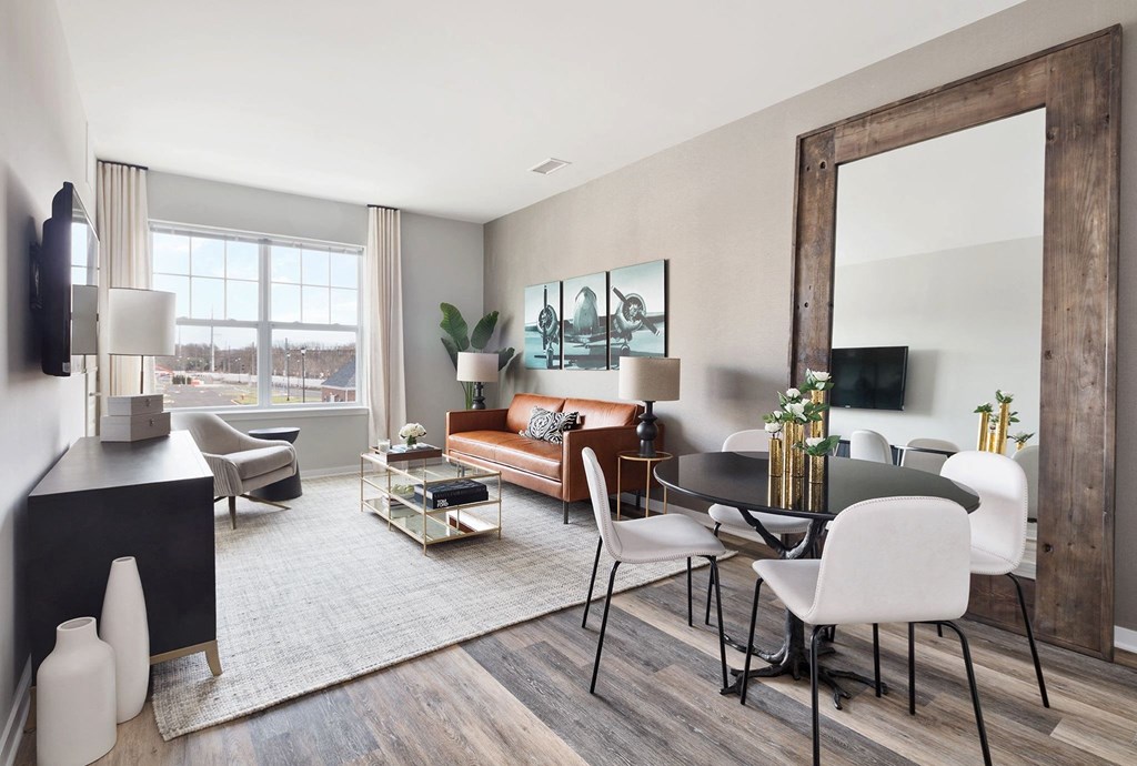 Living room with couch at Hillside Club Apartments, Livingston