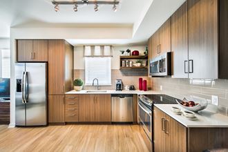 Gourmet Kitchen at 8000 Uptown Apartments in Broomfield, CO