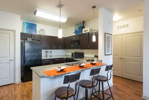 Kitchen at Arterra Place Apartments in Aurora, CO