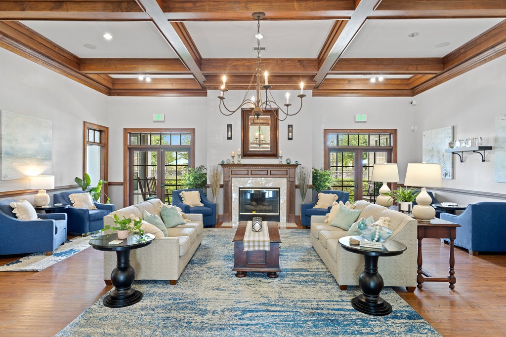 a living room filled with furniture and a fireplace