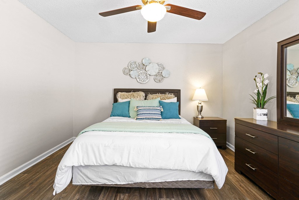 a bedroom with a bed and a ceiling fan at Diamond  Trail Apartments, Oklahoma, 73112