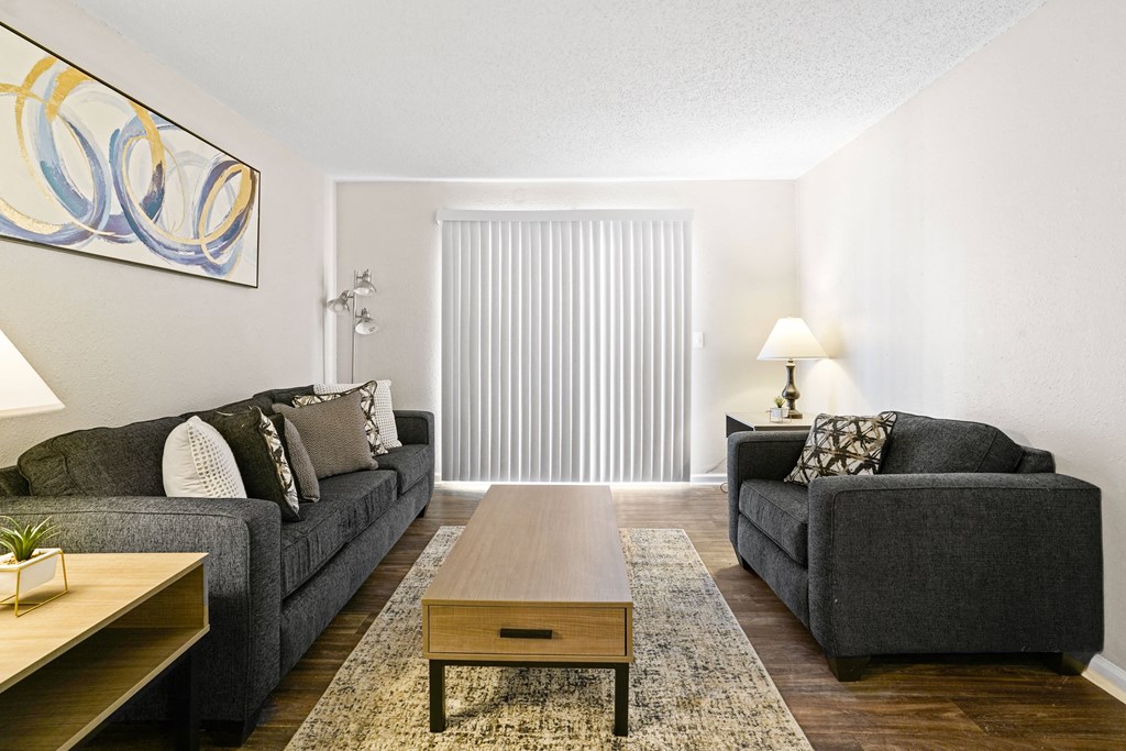 a living room with two couches and a coffee table at Diamond  Trail Apartments, Oklahoma City, OK, 73112