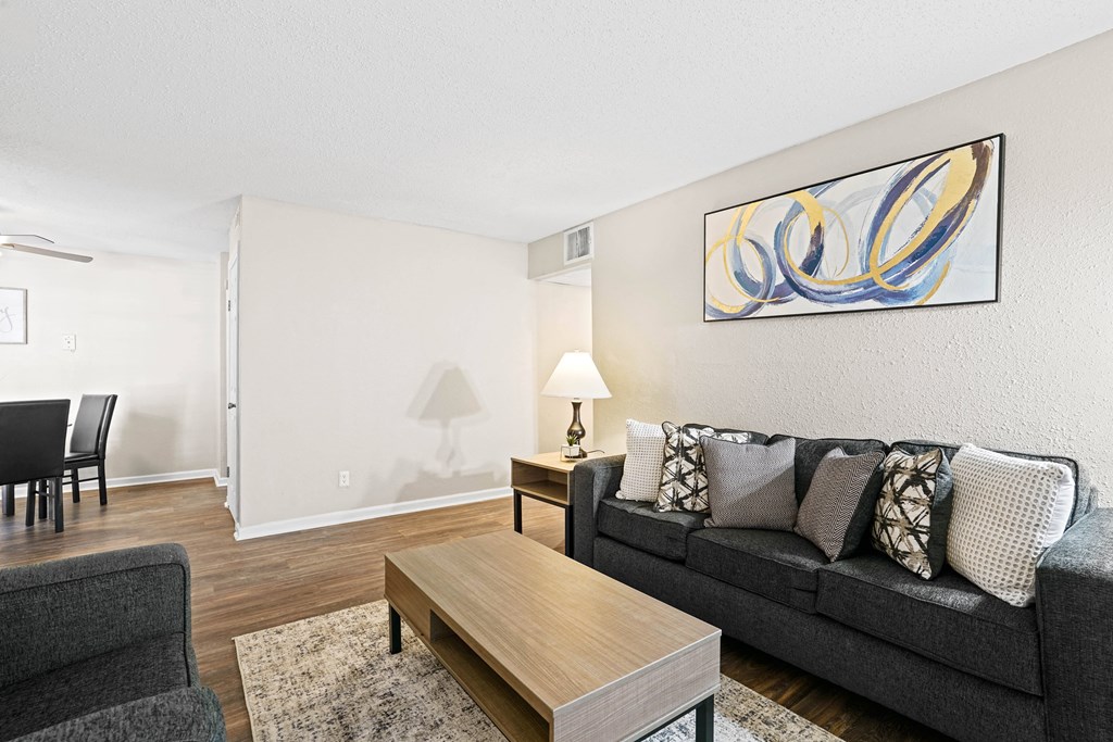 a living room with a couch and a coffee table at Diamond  Trail Apartments, Oklahoma