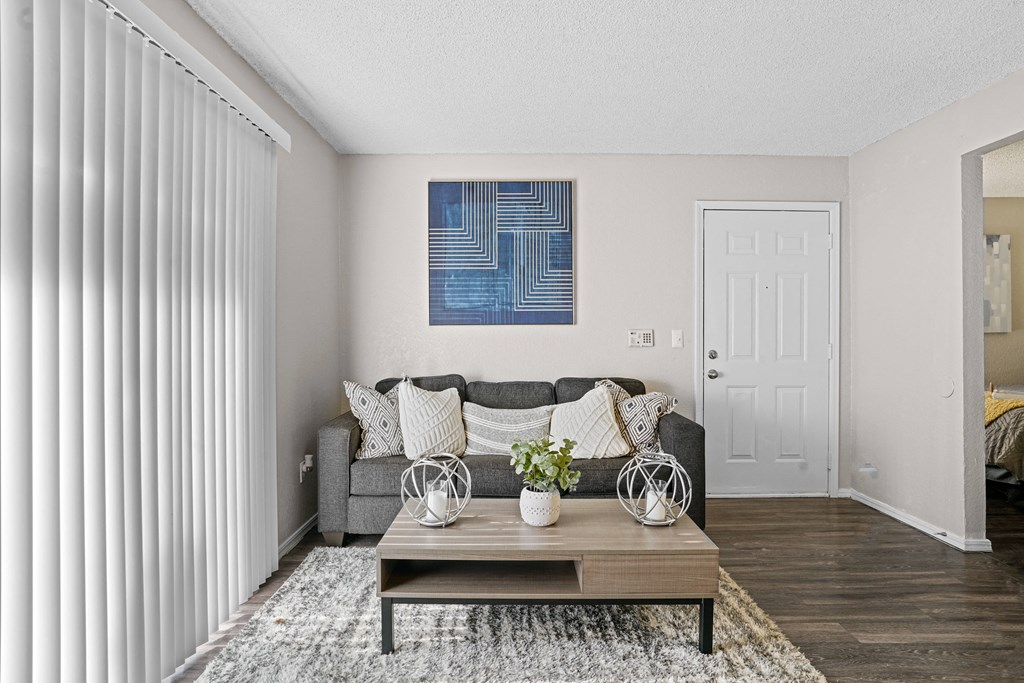 grey couch and small table in living room