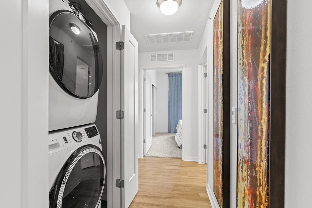 a laundry room with a washer and dryer