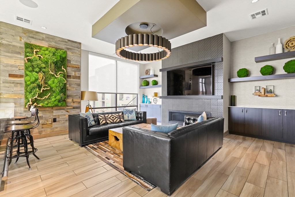 a living room with two couches and a coffee table at Union West Apartments, Lakewood, CO