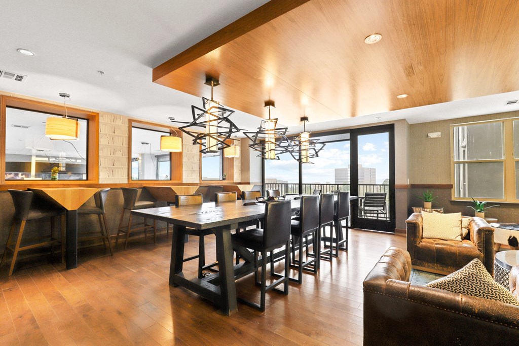 a large dining room with a large table and chairs at Union West Apartments, Lakewood, CO