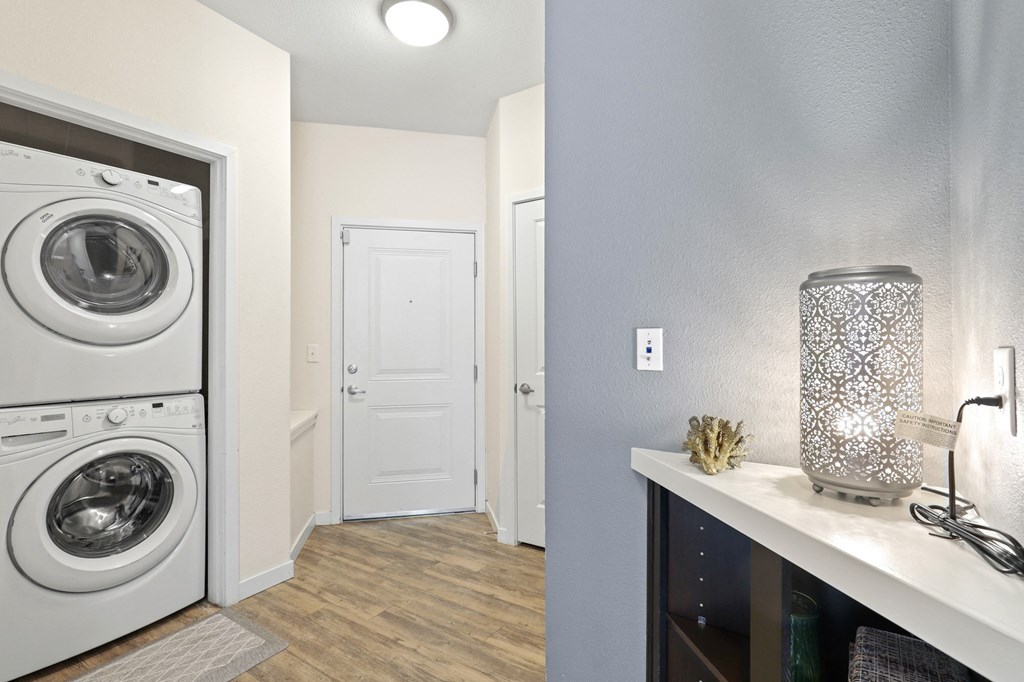 a small laundry room with a washer and dryer