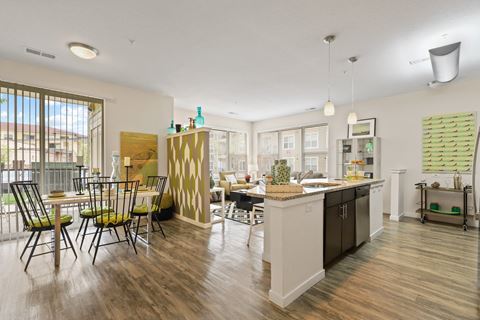 an open floor plan with a kitchen and dining area