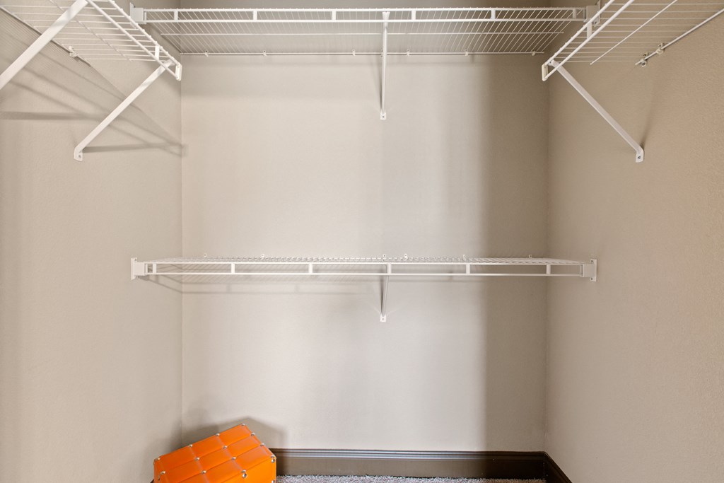 closet with white wire shelving at The Millennium Towne Center Apartments, Baton Rouge, LA