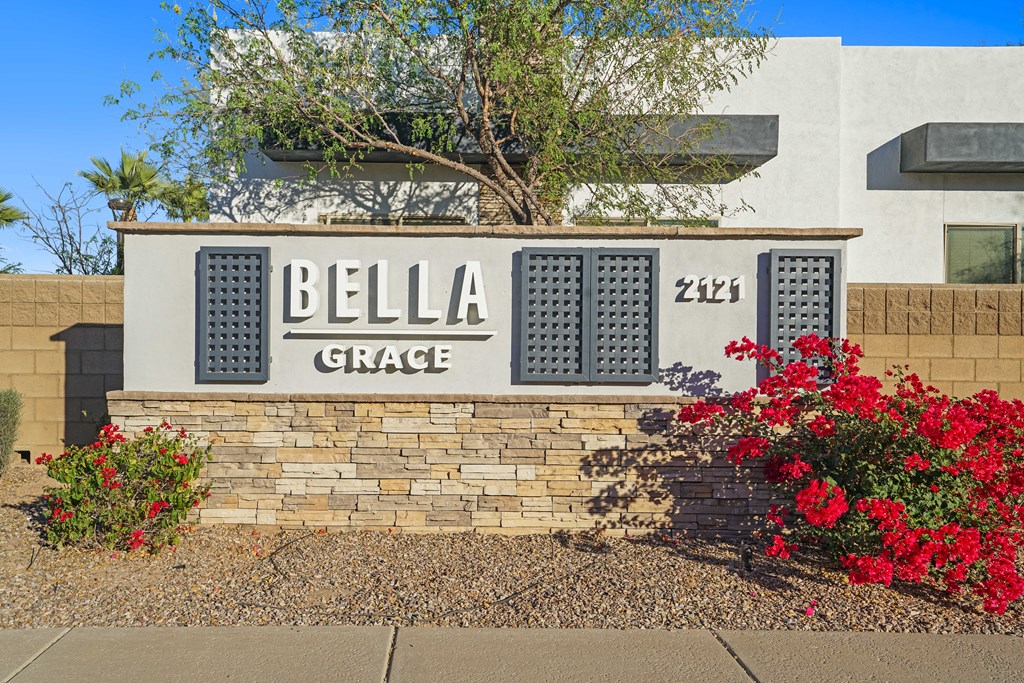 a sign in front of a building