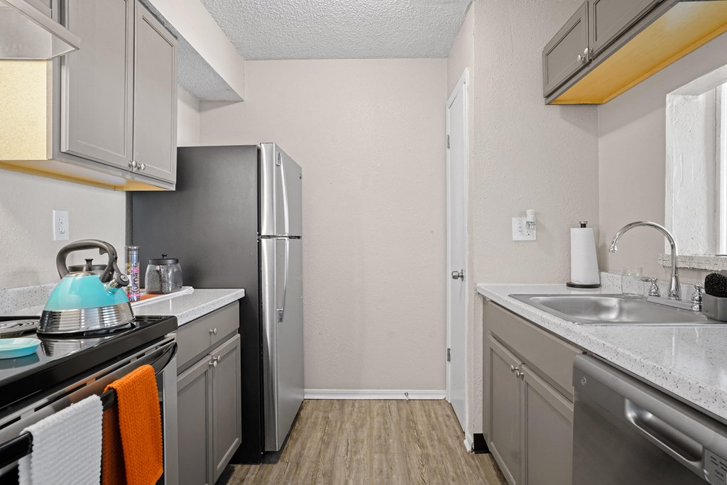 the preserve at ballantyne commons apartment kitchen with stainless steel appliances