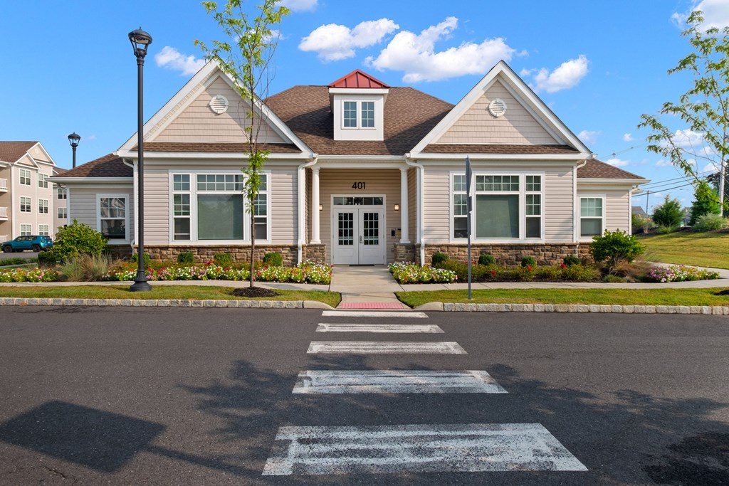 a house with a cross walk in front of it at The Landing Apartment , Hazlet, NJ