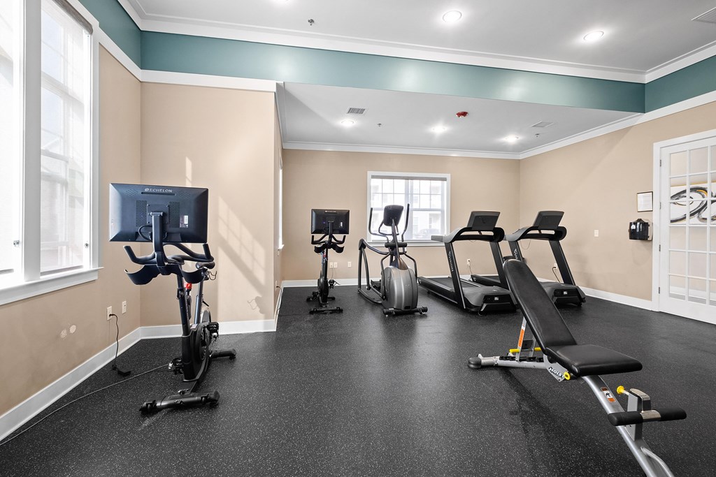 the gym with treadmills and exercise equipment at the enclave at The Landing Apartment , New Jersey, 07730