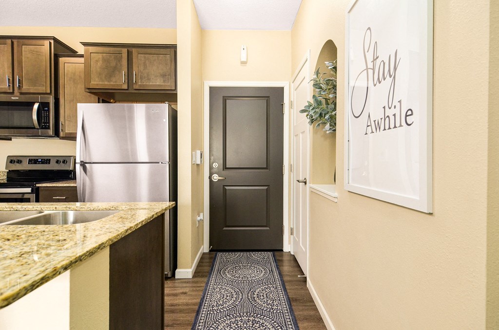 kitchen view with cabinets at Skye at Arbor Lakes, Maple Grove