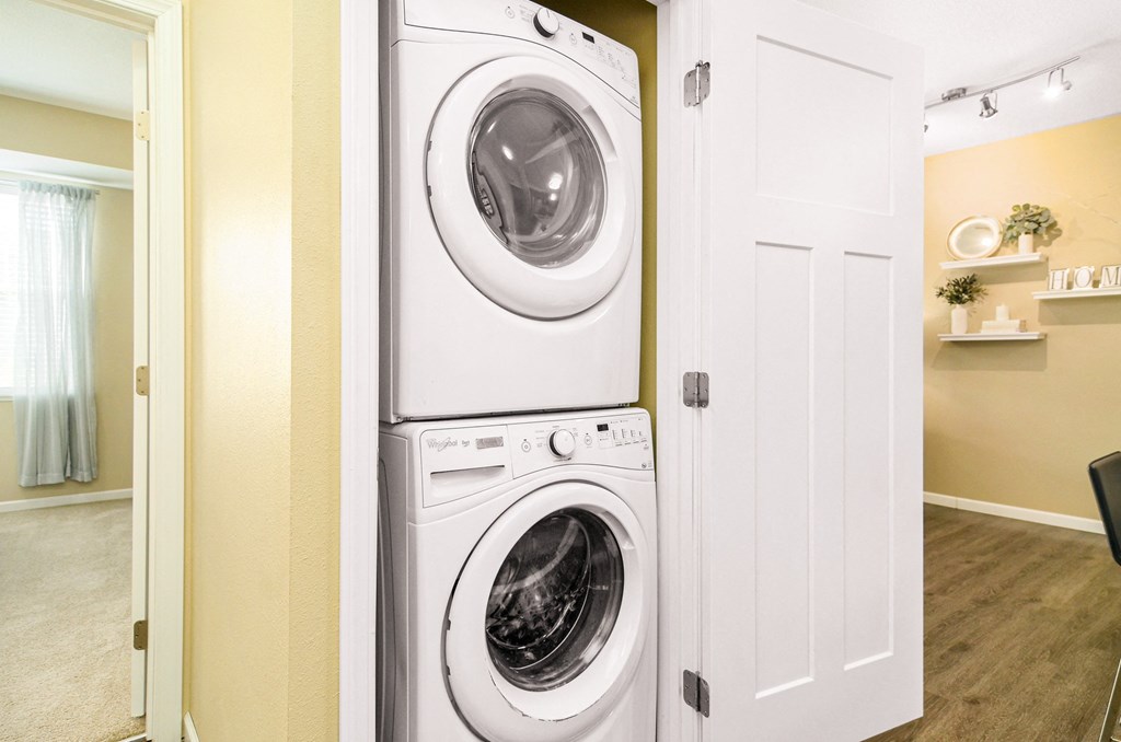 a washer and dryer in a laundry room at Skye at Arbor Lakes, Minnesota, 55369