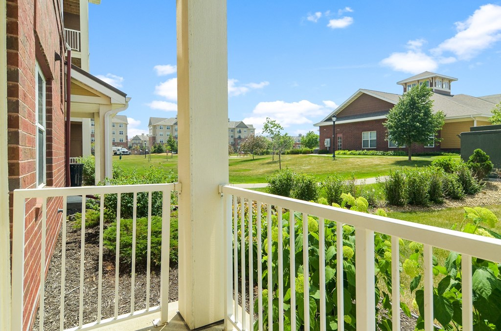 a view of the yard from the balcony at Skye at Arbor Lakes, Maple Grove, 55369