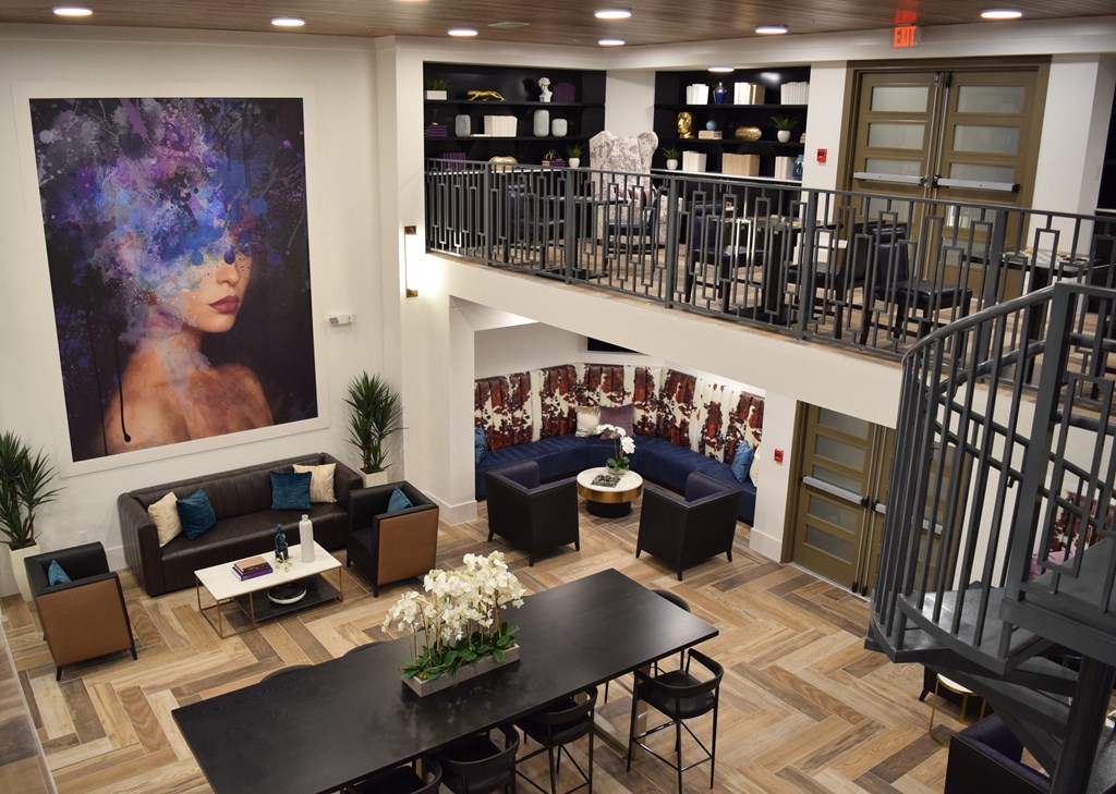 overhead view of large room with stairs and table at Magnolia Square, Florida