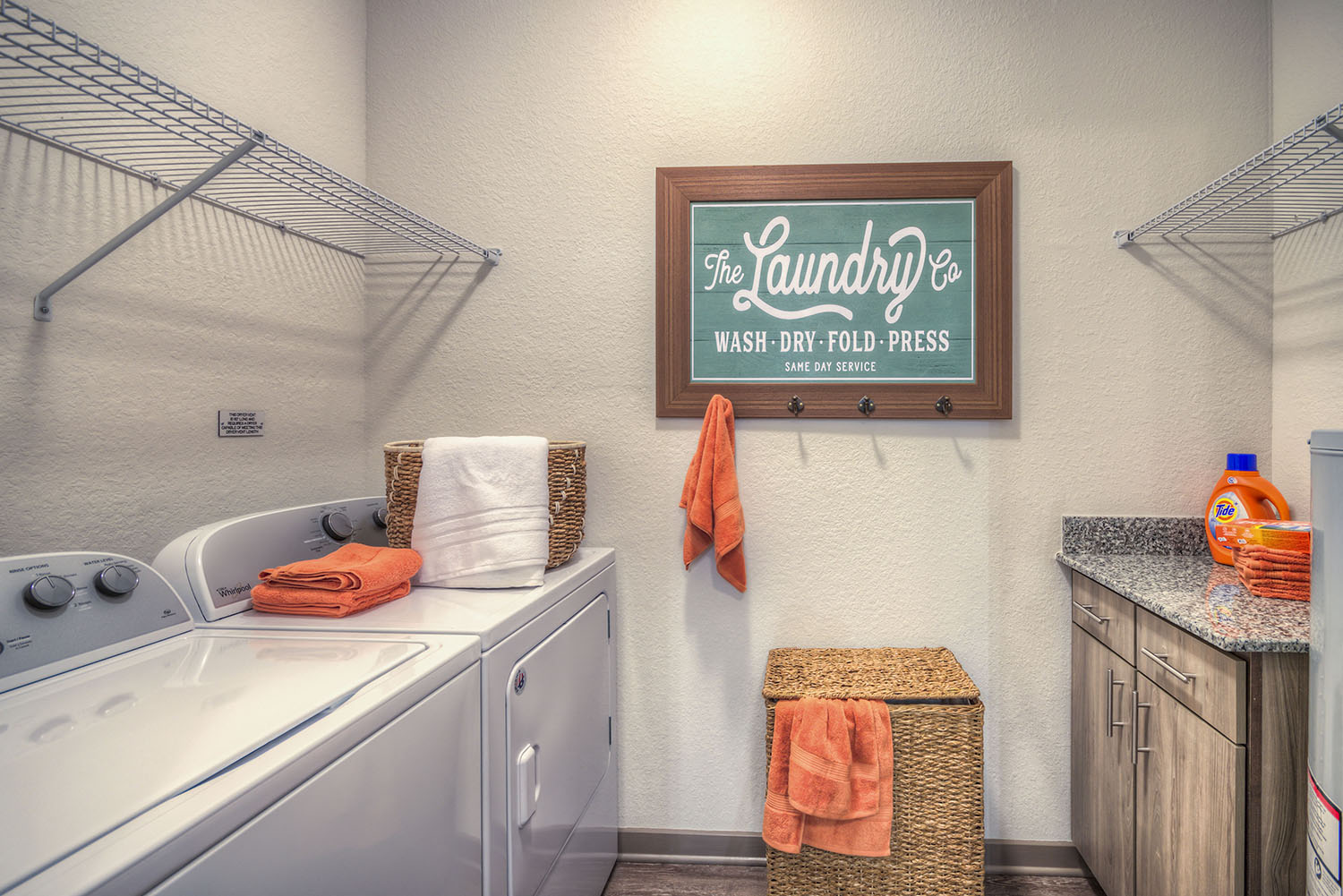 Laundry Room at The Strand Apartments in Oviedo, FL