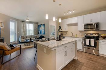 Kitchen with cabinets at JTB Apartments, Jacksonville