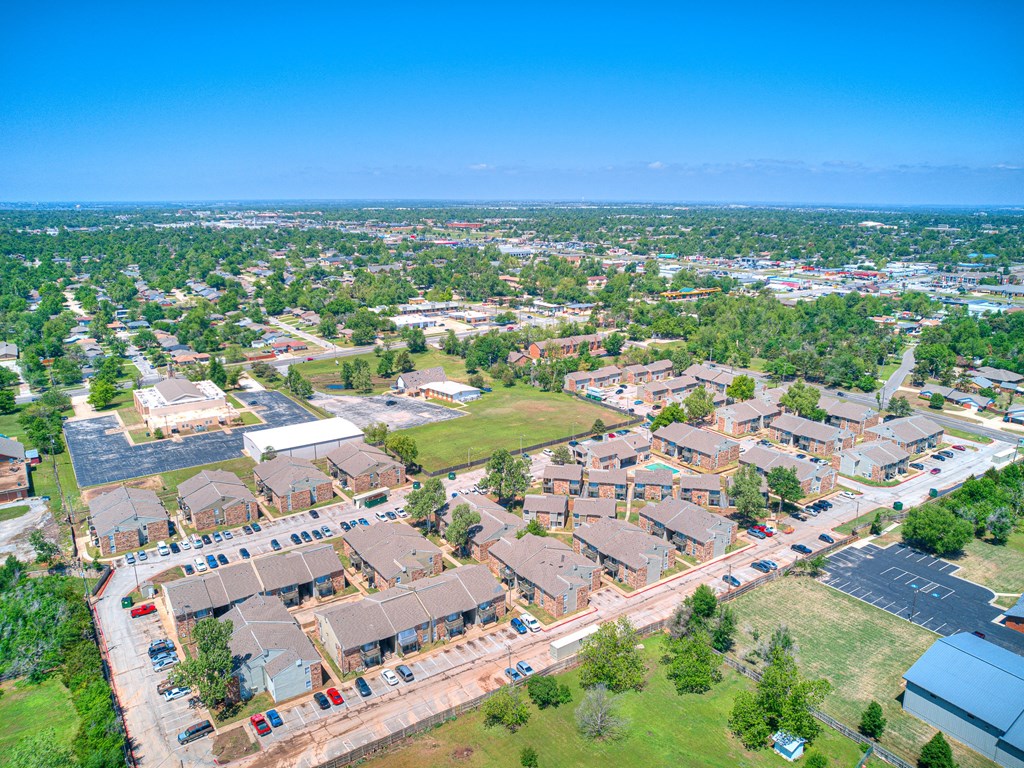 an aerial view of a neighborhood with houses and cars on the street at Diamond  Trail Apartments, Oklahoma City, OK