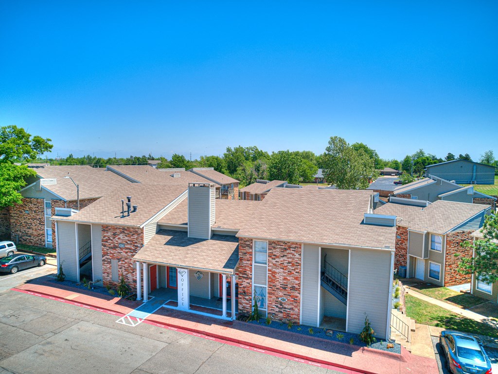 an aerial view of a building with cars parked in front of it at Diamond  Trail Apartments, Oklahoma City, Oklahoma