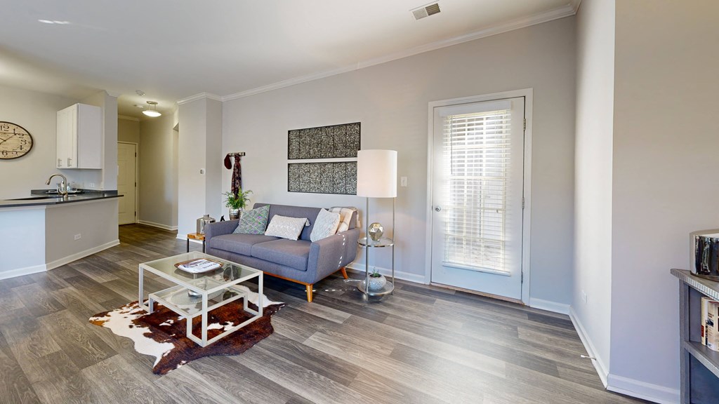 a living room with a couch and a coffee table at Dwell at Naperville, Naperville, IL